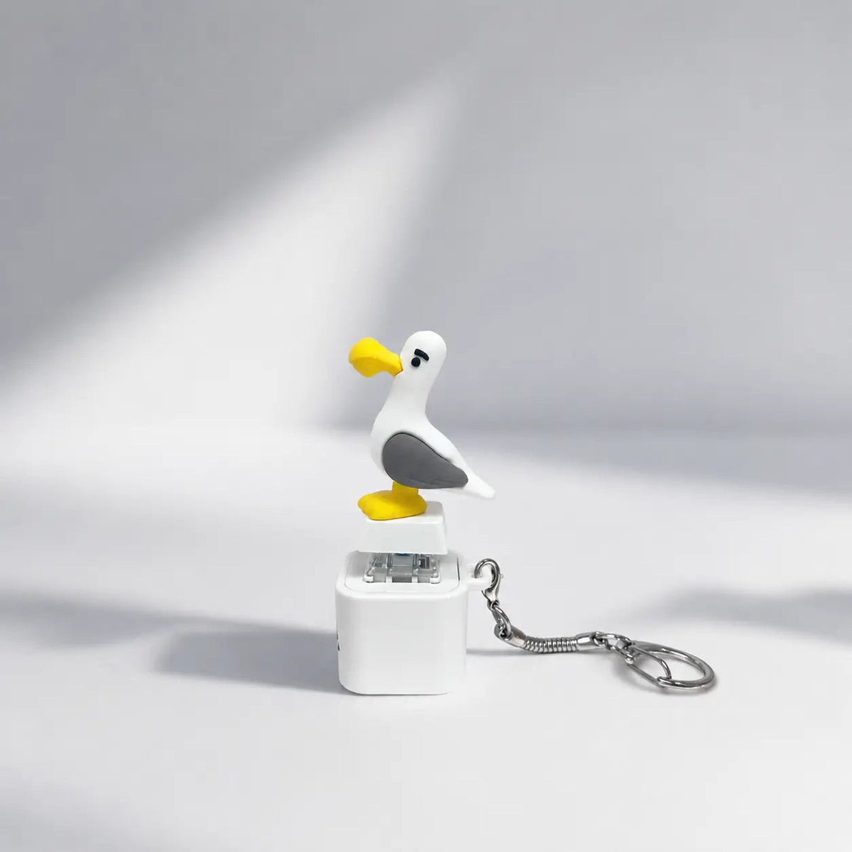 Side view of seagull keychain and keyring