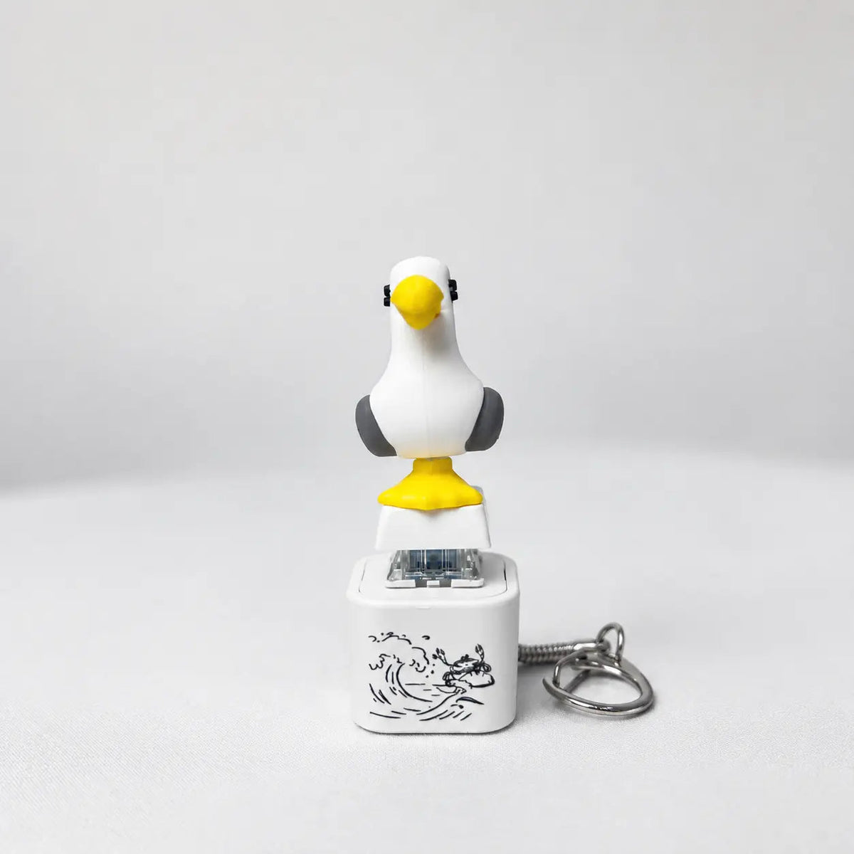 Seagull keychain with keyring on a white background