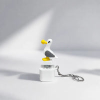 Side view of seagull keychain and keyring