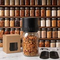 Cordless mason jar sealer and kit accessories on a pantry counter