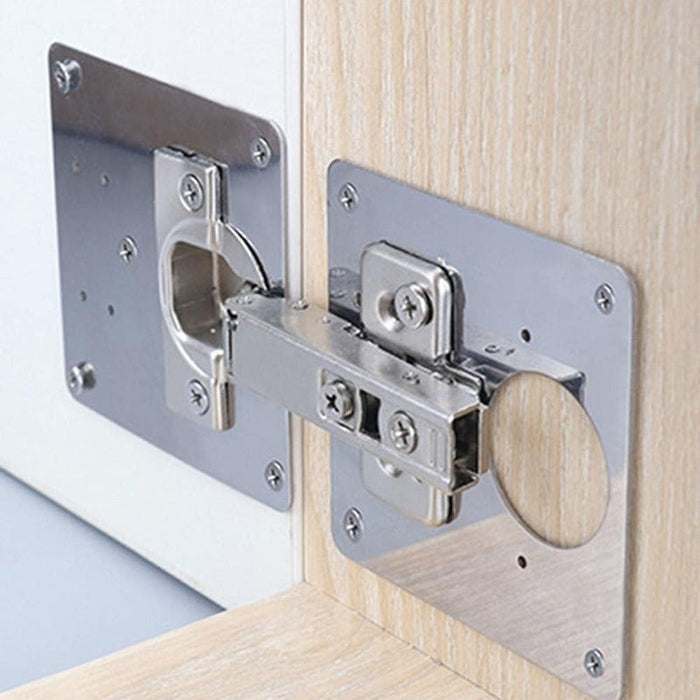 Close-up of stainless steel hinge repair plate